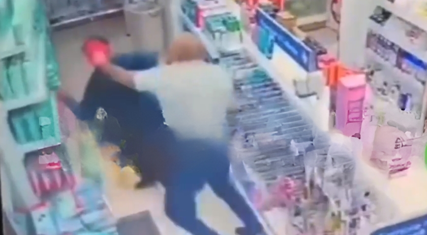 Bandido é espancado por comerciante
