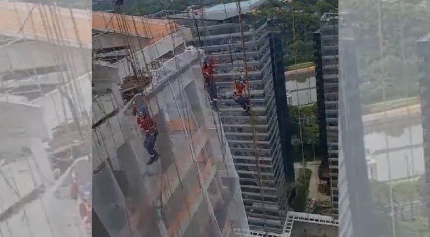 Operários ficam pendurados em andaime de 180 metros de altura e um deles morre em SP