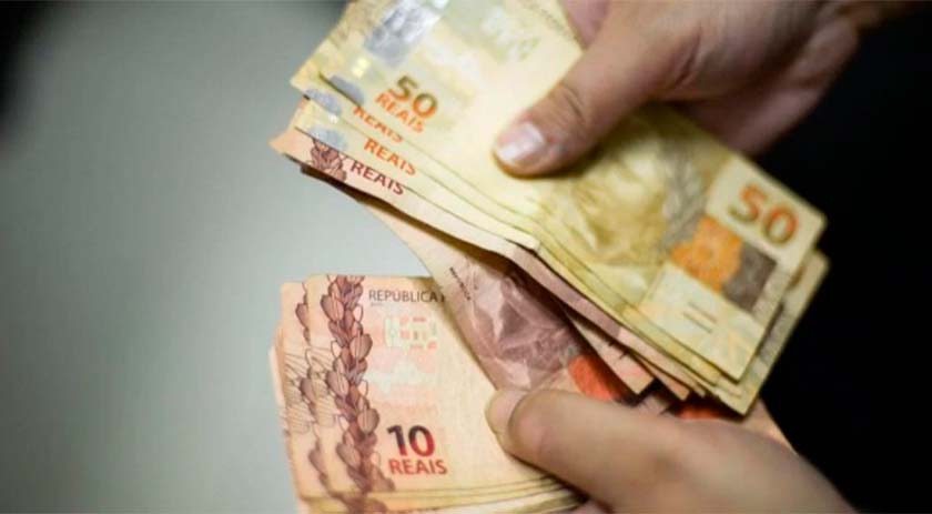 Caixa paga novo Bolsa Família a beneficiários com NIS de final 2
