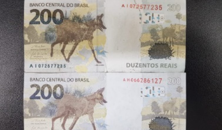 Mulher vende celular pela internet e recebe 3 notas falsas de R$ 200
