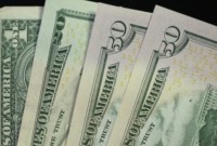 Dólar cai a R$ 4,98 e acumula perda de 4,44% na semana