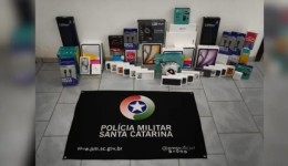 iPhone escondido dentro de pote de bolo chama atenção em apreensão de R$ 200 mil em SC