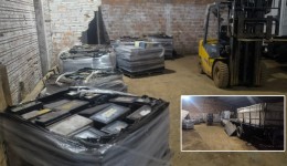 Polícia apreende carga de baterias e caminhão durante operação em galpão
