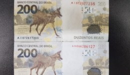Mulher vende celular pela internet e recebe 3 notas falsas de R$ 200