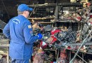 Após incêndio, famílias retiram pertences de prédio