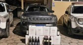 Casal foge da polícia, joga caixas de vinho na estrada e acaba detido por descaminho