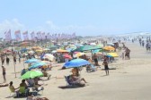 Foragido por roubos é capturado tomando sol em praia no litoral de SC