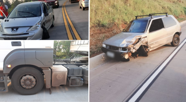 Acidente de trânsito envolvendo dois carros e um caminhão